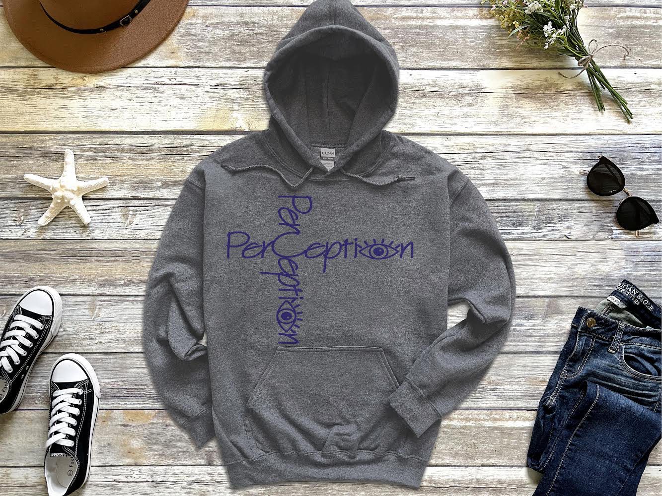 A gray hoodie with the word perception written on it.